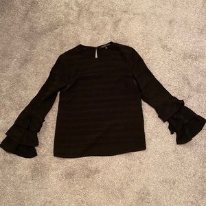 Black blouse with bell ruffle sleeves. Size small